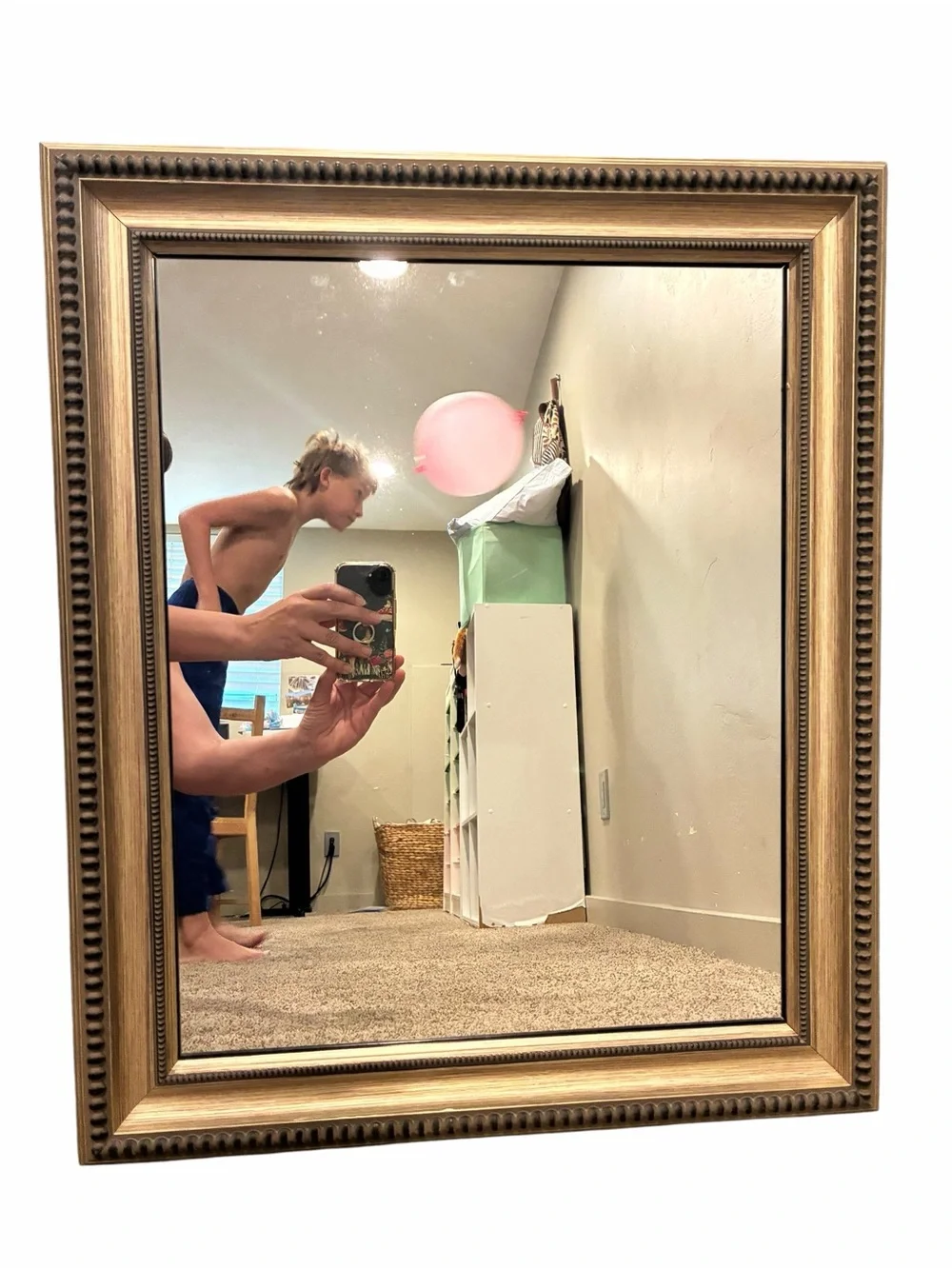 2 20.5”x24.5” vintage style wall mirrors feature a champagne gold frame